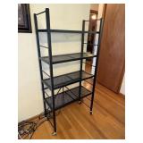 black metal 4 adjustable shelf unit on wheels