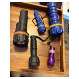 5 flashlights, 4 rubber, 1 metal