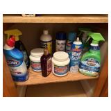 shelf of cleaning supplies, scrubbing bubbles,