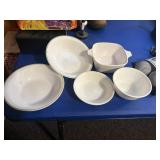 5 corelle corning dishes,   basement