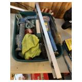 tray of tools level, caulk gun, chalk line, wire