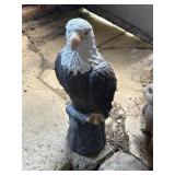 resin eagle on stump   back porch