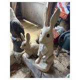 2 outdoor decor bunnies,  back porch