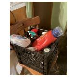 milk crate of cleaning supplies   basement kitchen