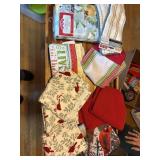 7 teatowels, pot holder, tablecloth, 2 floor pad