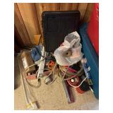 pile of household surge protectors, hardware,