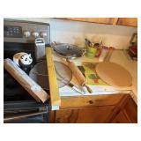 tupperware salt n pepper, rolling pin, pan, mug