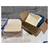 assortment of envelopes, file holders, file