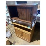 microwave stand and old cabinet with sliding doors