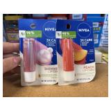2 nivea lip cares, 1 peach 1 shimmer