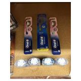4 crest travel mouthwashes& 4 oral B toothbrushes