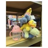 plush stacking toy animals and sippy cup