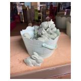 bucket of green flocked bunnies sitting  (fuzzy)
