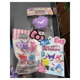 Hello Kitty mystery slime, build figure, & squishy