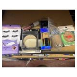 eyelashes, foundation, lip gloss, bronzer