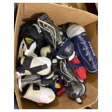 lacrosse gear, box of gloves, leg & arm pads,