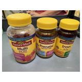 prenatal vitamins, iron and gummies for her