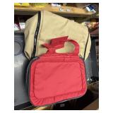 red casserole carrier, and tan insulated carrier