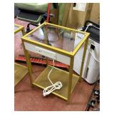 gold tone side table with electric and usb outlets