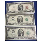 3 ($2) bills in wrappers,