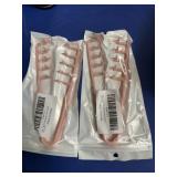2 textured hair combs,