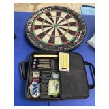 dart board and bag of darts and other supplies