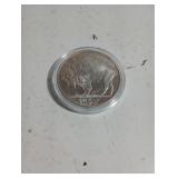One troy ounce silver round
