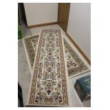 Two Matching Floral Rugs