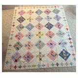 White Patchwork Quilt