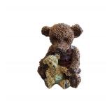 Single Teddy Bear holding baby Bear