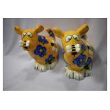 A Pair of Ceramic Cow Bank