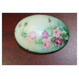 A Porcelain Brooch