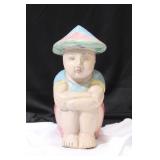 A Polychrome Woodcarving of a Boy