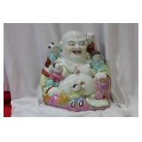 A Vintage Porcelain Buddha with Children