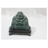 A Nephrite Jade Buddha On Stand