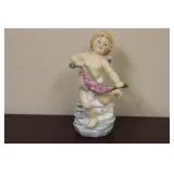 A Doulton Figurine -'Cherubs of the Arts -Dance'