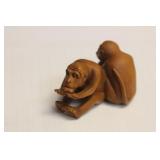 A Signed Japanese Wooden Netsuke