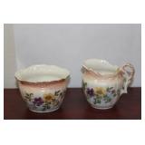 A Pair of Cream and Sugar Containers