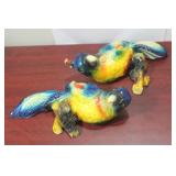 A Pair of Ceramic or Chalk Parrots