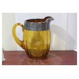 A Silver Overlay Amber Glass Pitcher