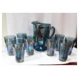 A Carnival Glass Pitcher and Tumbler