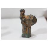A Polychrome Worker Figurine