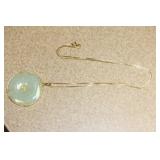 14 Karat and Jade Pendant with a 14Kt Gold Chain