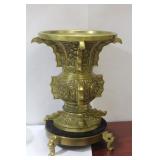 A Chinese Bronze Urn on Stand