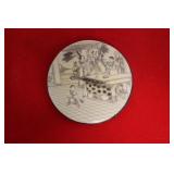 A Sterling and Carved Bone Brooch