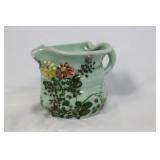 An Asian Celadon Pitcher