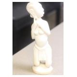 African Bone and Nude Statue