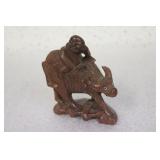 A Vintage Chinese Wooden Cow with Rider