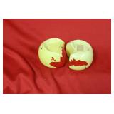 A Pair Of Cheese Form Salt And Pepper Shakers