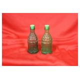 A Pair Of Glass Salt And Pepper Shaker